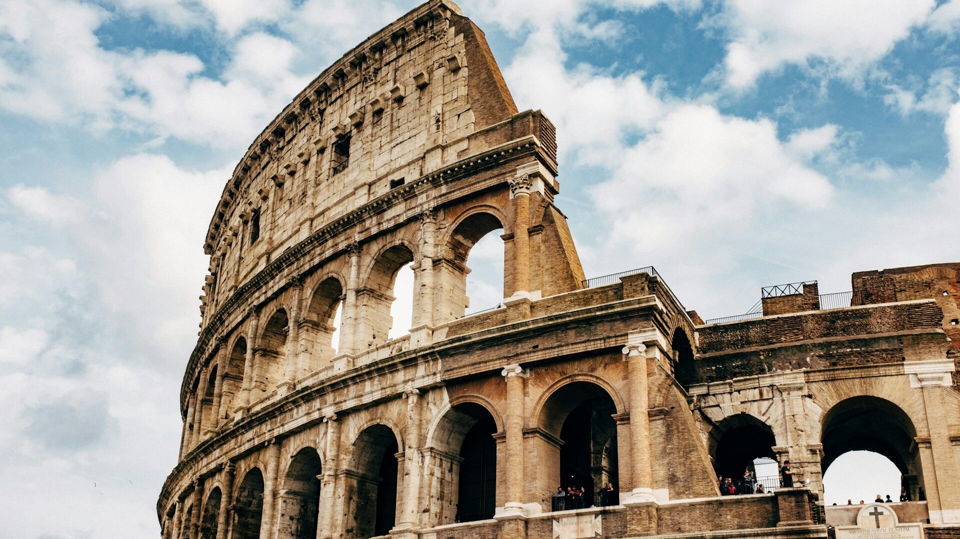 Structure of the colosseum in Rome with a sky background