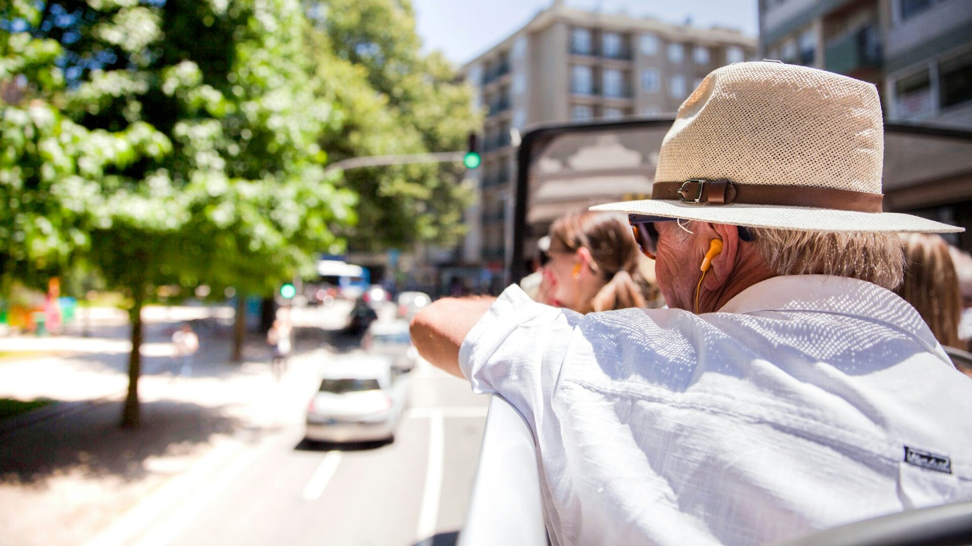 Man on a sightseeing bus tour